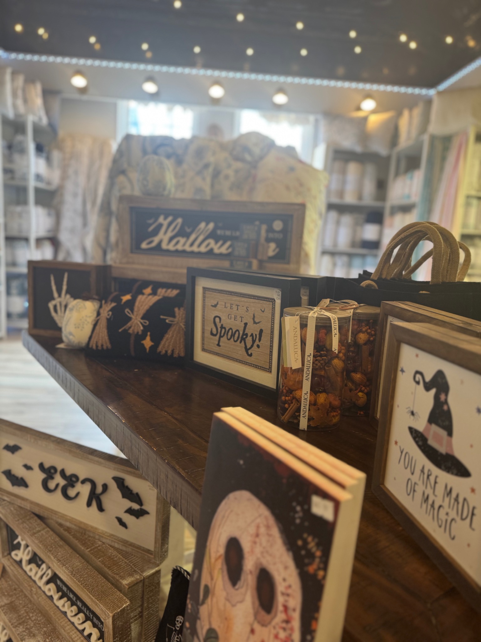 Fall gifts, framed signs and seasonal décor displayed inside the HIVE Market